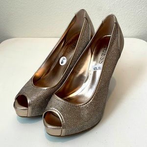 Guess gold heels size 6.5.